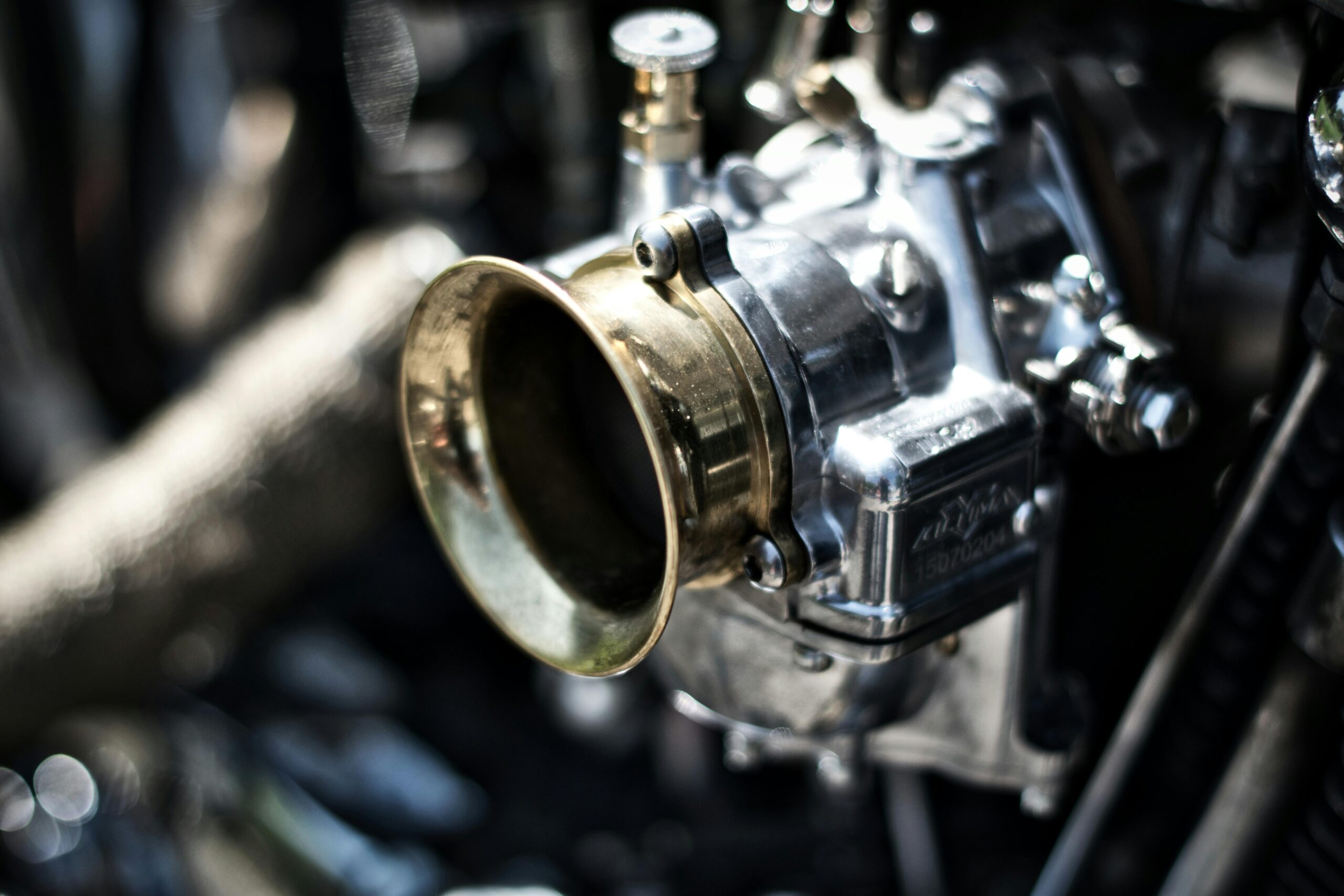 Detailed shot of a motorcycle engine component showcasing metallic textures.